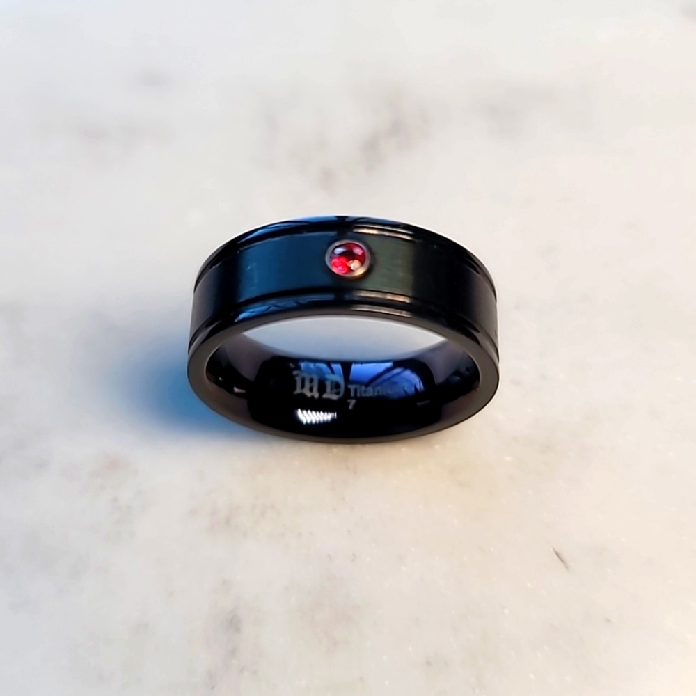 Black Titanium Ring with a red sapphire